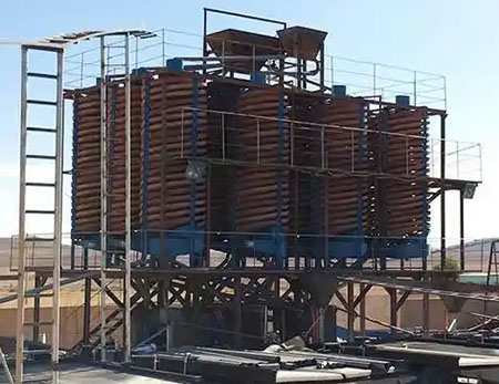 What are the valuable minerals in coastal sand?